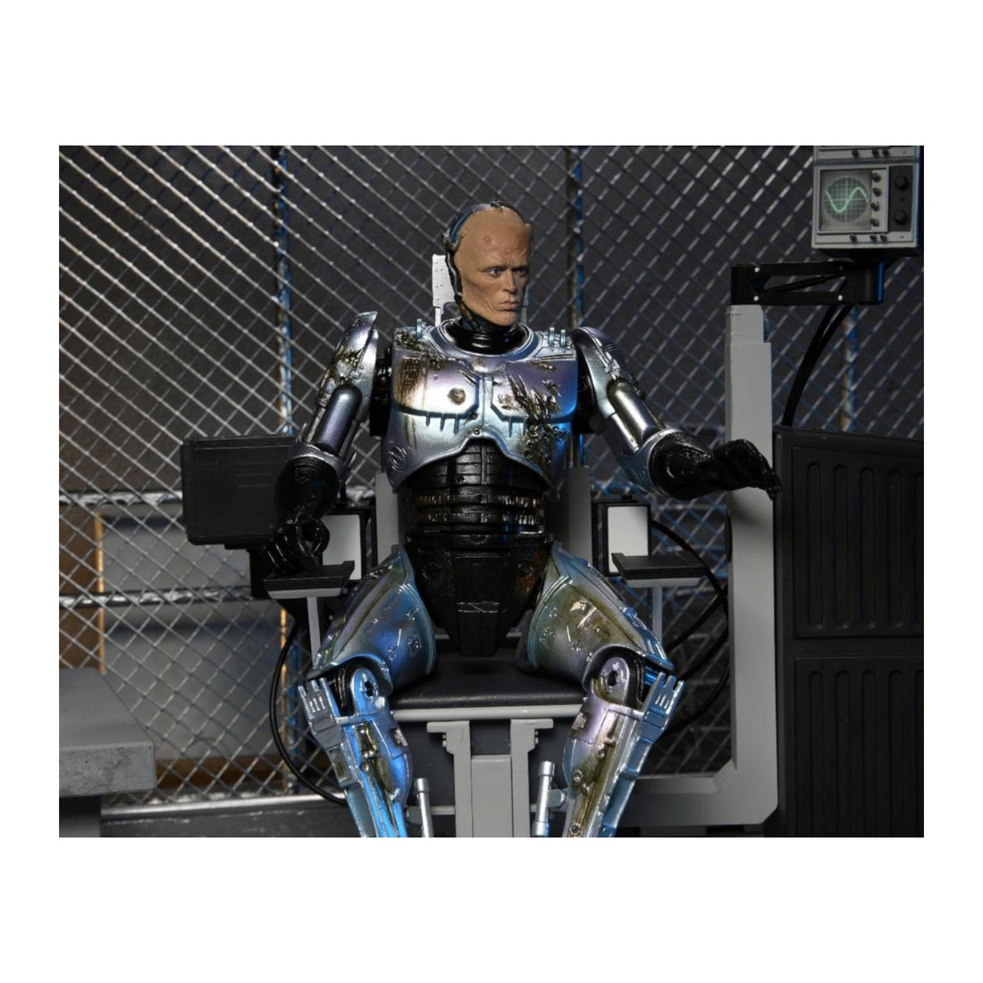 Neca 7" Scale Ultimate Action Figure Robocop (Battle damaged with chair)