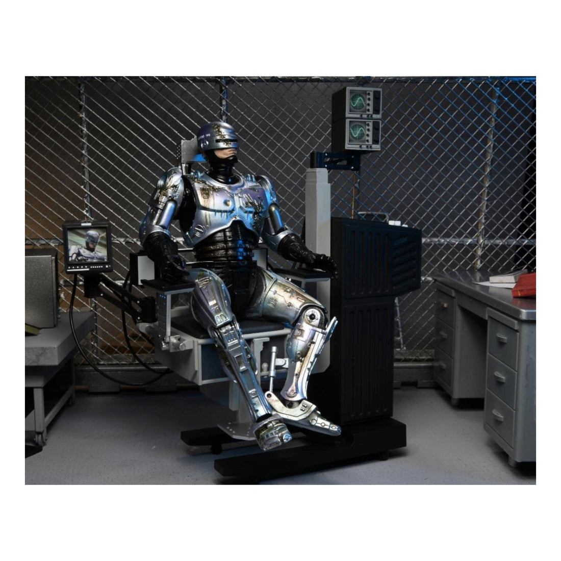 Neca 7" Scale Ultimate Action Figure Robocop (Battle damaged with chair)